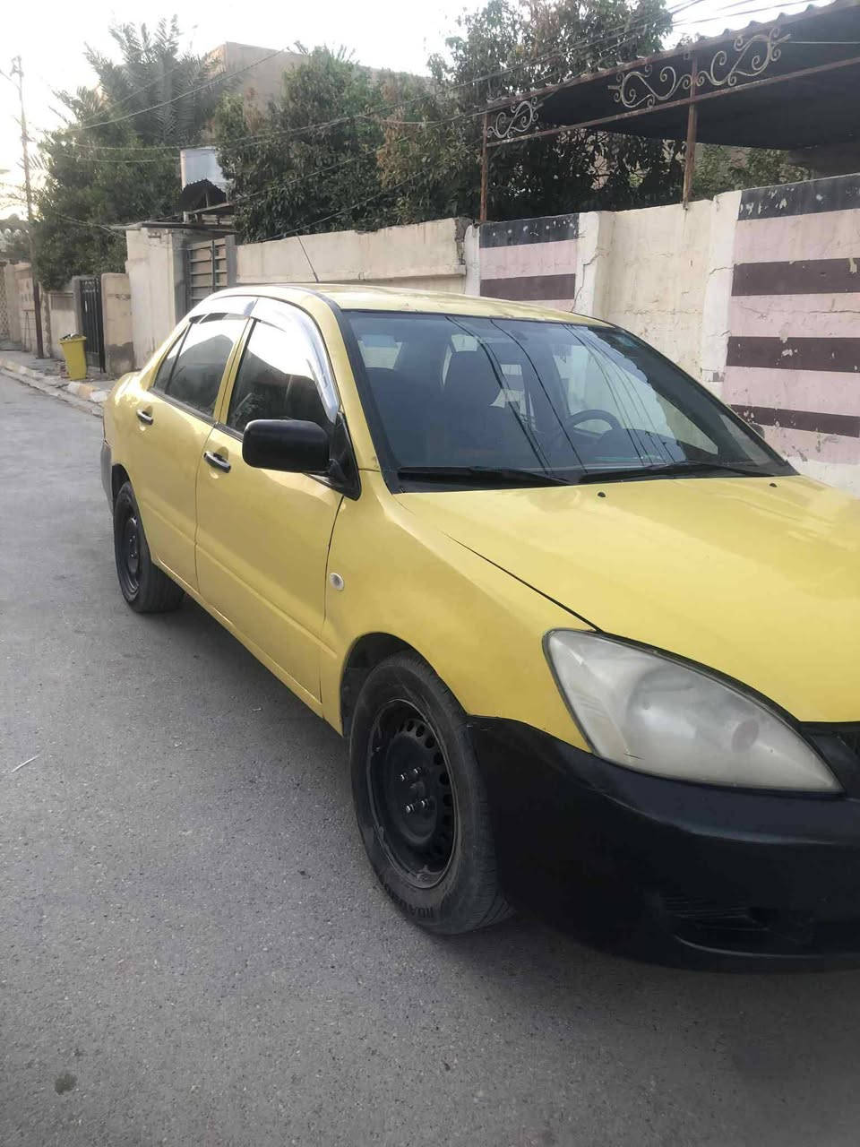 السلام عليكم لانسر2010رقم ديالى جديد بأسمي  للبيع او مراوس بخصوصي  جاهزة بدون نقص ضرر بنيد مبدل وجامرلغ امامي بدون دواخل باقي السيارة بلادية السعر 66 وبيها مجال *********** المكان ديالى دلي عباس
