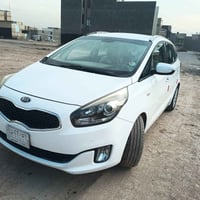 كيا كارنز  Kai carenz  ٧ راكب خليجي رقم بغداد  موديل ٢٠١٤   لون ابيض  ...
