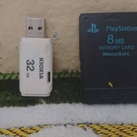 بلي 2 نضيف فلاش 32G كارت ميموري 8M بيه اكثر من 40 لعبه رقمي 0777088363...