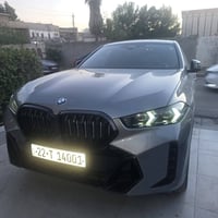 bmw x6 2024 ماشيه 32 الف كيلو بدون ايرباك مكانها بغداد حي الجامعه بسمي...