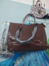 جنطه • جلد روغان • اصليه