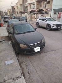 بروتون جين 2 ٢٠١٦ اسود اللون ماشية 104 الف للبيع السعر ٧٥ ورقة  077043...