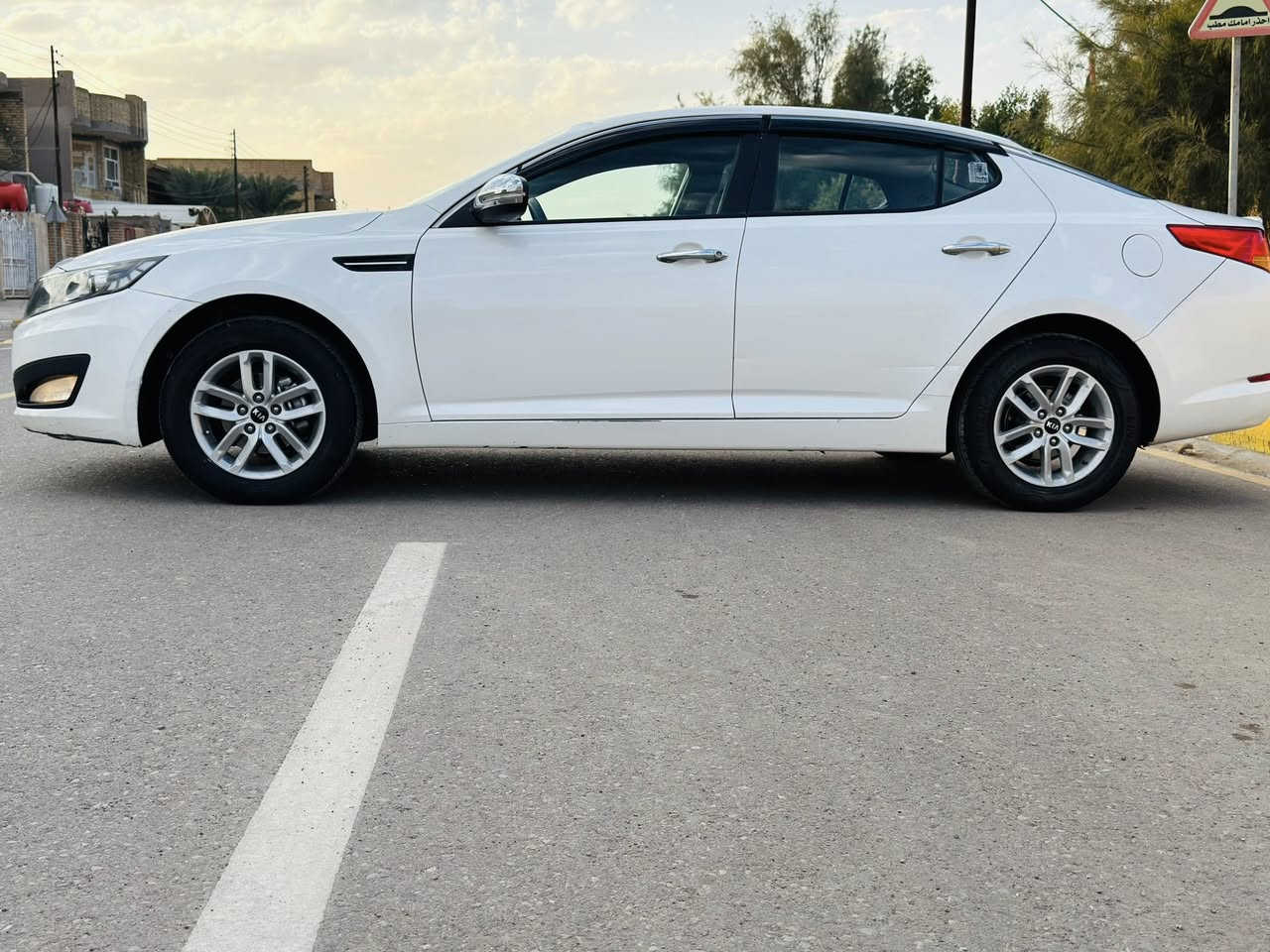 للبيع اوبتيما2014خليجي رقم ديالى تحويل مباشر سنوية جديدة بيها صبغ ٣قطع فقط  بدون حادث سيارة جاهزة ع الاخير مكينة كير تخم تاير حدادية ١٠٠٪؜شرط مال جناي مكينة 2000مكفولة مكينة وكير مكفولات تبريد ثلج ❄️تدفئة عليها ادامة جديدة شرط احلى من الصور متصرف عليها الف موصفات ٣وضعيات قيادة شفتات ستيرن السعر 125وبيها مجال العنوان واسط للاستفسار ***********او ***********ممتواجد ع النت
