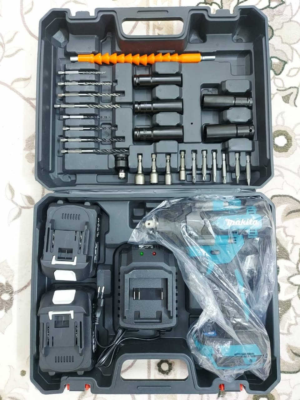 دريل لقمة MAKITA فحل2000 نيوتن اربع سرعات مع دبل بطارية الحجم الكبير مع شاحنة سوبر جارج مع حقيبة مع تحويله امباكت درنفيس براين  كامل ملحقات السعر 60 ويه التوصيل ***********
