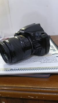 نيكون 3100D • عدسة 55مم • بيع مستعجل