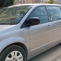 دوج كرفان 18كلين نص فول سيارة جاهزة من كلشي السعر 145// 07704699956