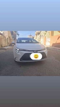 كورلا هايبرد 2024 رقم بغداد بصمة فتحت سقف  دخول ذكي مانع انزلاق  تحكما...