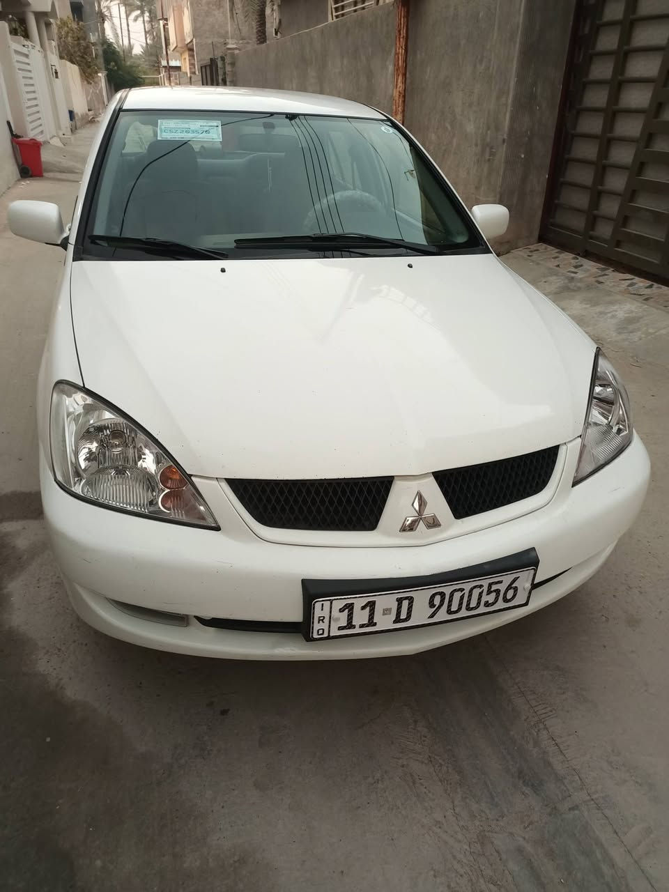 السلام عليكم شباب لانسر موديل 2011 رقم بغداد الدولي الجديد بسمي السياره مكفولة كفاله  عدا شبر بالباب مال سايق السياره تخم تاير جديد صدر جديد مكينه على وضع الشركه السياره كتب الشركه بيها سبير منازل سويجات عدد 2 السياره بلاجكتور زنون منضومه غاز السياره مالك اول من الشركه السعر 98 مكان السياره ديالى بعقوبة وهذا رقمي ***********
