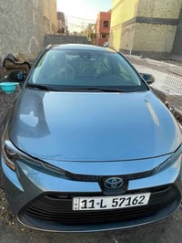 كورلا هايبرد 2022  ماشيه 50 الف  رقم بغداد  وارد امريكي  وليس صيني  حا...