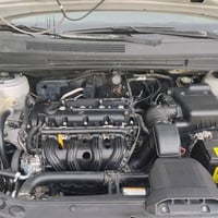 كيا كارينز محرك وكير جديد تبريد ثلج قطعتين داخل صاج سياره مصبوغه حزام ...