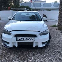 لانسر قرش 2009   محرك جديد 2000   2026 شديته   ، كير نظيف   داخليتها 8...