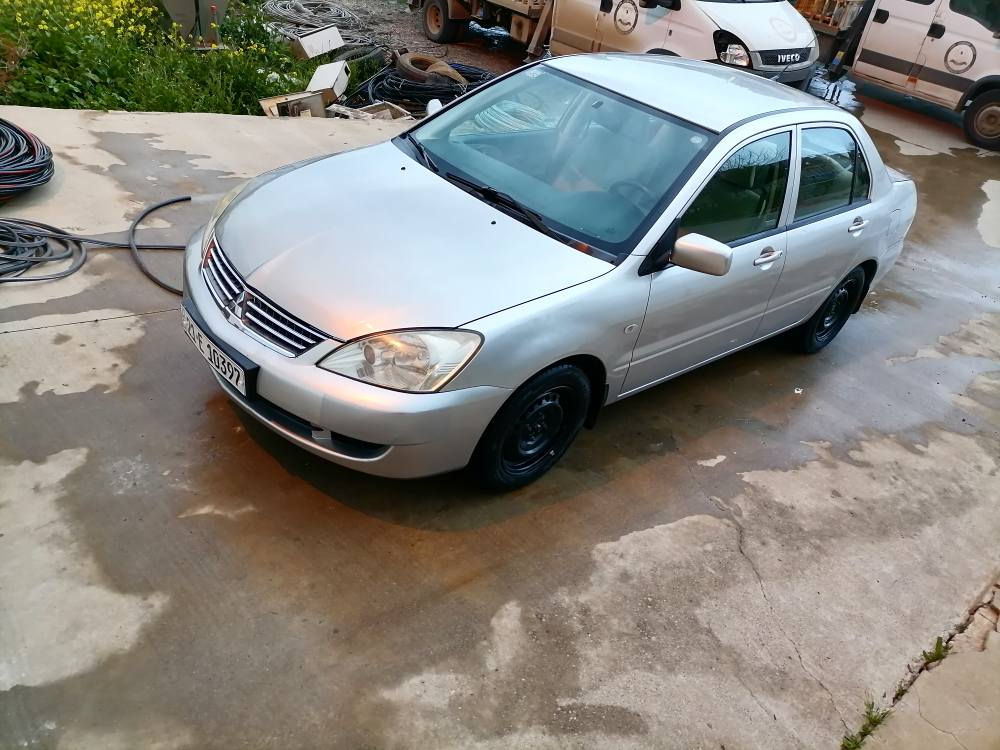 ***********
لانسەر 2011 مەکینە گەرە ناوزەرد ئۆتۆماتیک ئاوینە کارەبا جا کارەبا 
کاڵ بونەوەی نیە لەسەرساغی بۆنیدی بۆیاخە هیچ دەعمی نیە  تایەی تازەیە سەنەویتازەیە جام کارەبایە  کەم ڕۆشتوە 87$ معامەلە شربازهير, السليمانية
