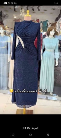فستان • قياس ٤٢ • ملبوس مره وحدة