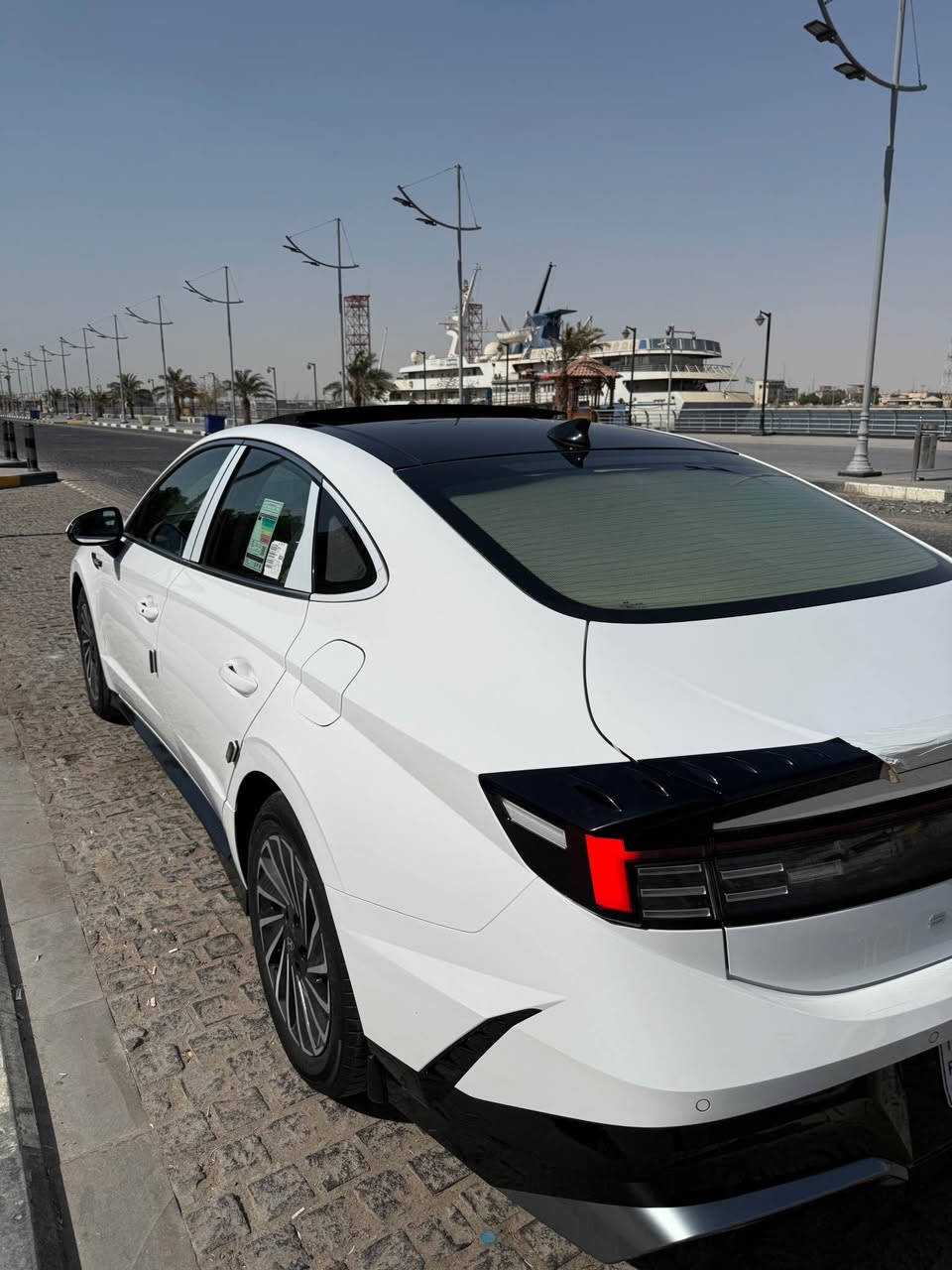 السلام عليكم 
سوناتا هايبرد 2024  ( خـليـجـي ) 
 اقساط ( نظام مقترض وكفيل ) راعيها بغداد
ماشيه ( 42 ) الف 
كفاله عامه / عده بارد بل باب سايق بدون زلغ 
فول مواصفات 1/1
حجم المحرك .. 2000 هايبرد 
بانوراما + بصمة + تشغيل عن بعد 
حساسات أمامية و خلفية 
لايت زينون + LED متصل 
بك لايت LED متصل 
دخول بصمة ذكي 
المرايا كهرباء 
هاند بريك كهرباء  
دشبول شاشة ديجيتال متصل 
شاشة Apple Car play and Android Auto 
كاميرا دوارة 
الانارة الداخلية LED ٦٤ لون متغير 
مقاعد جلد 
شفتات مقود مثبت السرعة Cruise 
المودات والاوامر الصوتية 
شاحن هاتف Wireless 
المقاعد الأمامية كهرباء 
تبريد شاشة مناخين منفصلين 
قطعتين تبريد 
أوتو هولد Auto Hold  
بردات أبواب خلفية 
تطعيم الدواخل ألمنيوم 
السعر … 205  
للاستفسار … ***********
                … *********** البصرة, العراق
