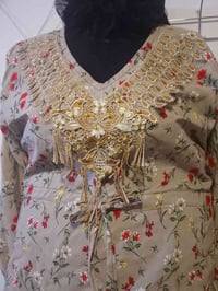 الغزالية شارع المشجر خياطه وحجامه 07724581181