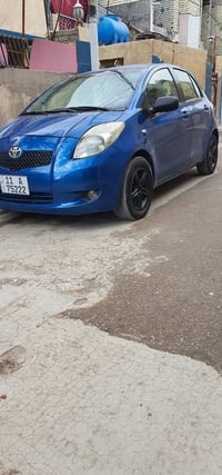 تويوتا يارس ٢٠٠٧ خليجي هاج باك للون ازرق جويتي صبغ حزام بسبب اللون  مح...