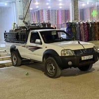 نيسان • دابل اكسل • ٢٠٠٢