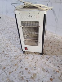 صوبة كهربائية 10 شمعات شغالة نضيف سعرة ١٥ الف 07750005224