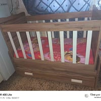 جربايه طفل • مستعملة شهرين • مع دوشك