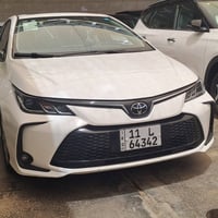 ♦️تيوتا كورلا 2024 هايبرد ♦️  خليجي مكفول  أرقام بغداد  عداد 19000كم  ...