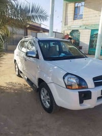 توسان 2009 بدون صبغ بيها بارد والسونار مرفق مع الصور بلحقيقه احلا من ا...