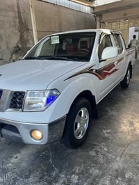 البيع نيفاره مديل 2009 كير عادي سياره حلوه رقم بغداد سعر (90) $ وبيه م...