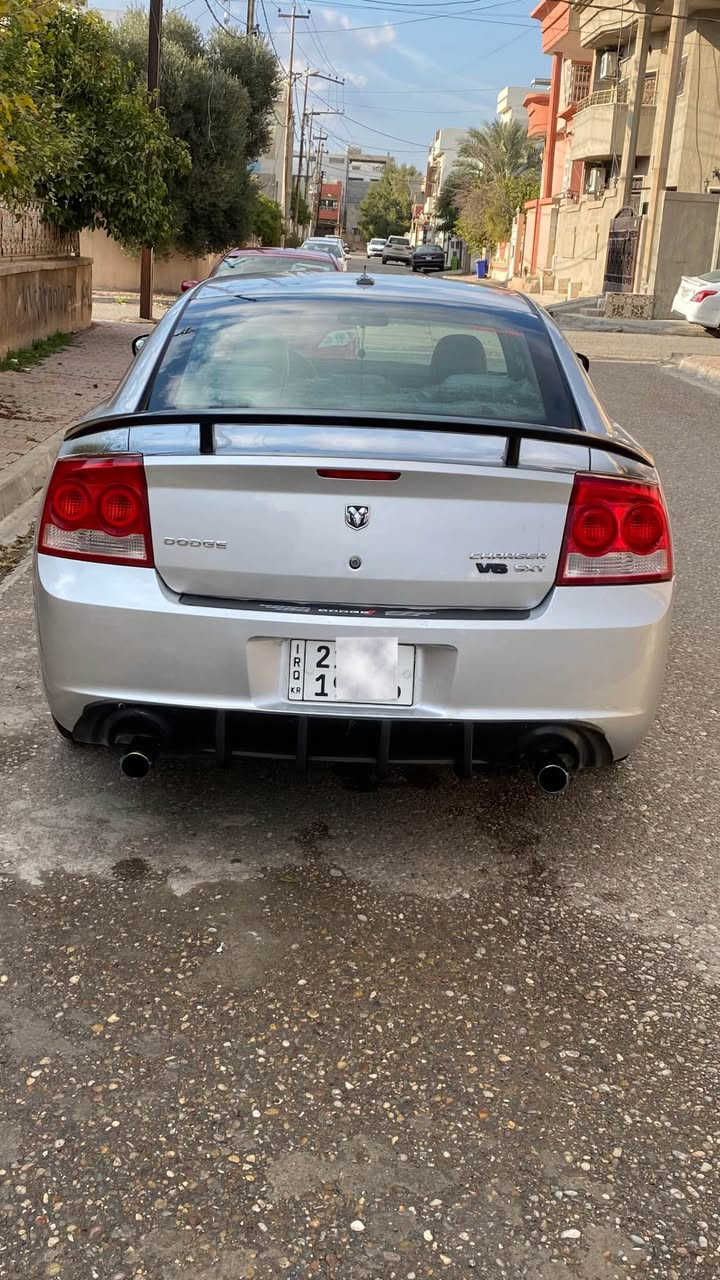 جارجر للبيع موديل 2010 مواصفات sxt رقم جديد سليمانية دولي سنوية بسمي لحد 2027 مكينة ٦ سلندر ٣٥٠٠ اصل هزة جديد ماشية ١٦٥ سيارة استخدام شخصي ما مشتغل خط بيها كوبون بانزين بسمي كير ومكينة خير من الله شرط ممفتوح نظام abs دواخل سيارة بالجيس كشنات جلد و تحكم كهرباء تبريد قطعتين ثلج كهربائيات كله شغال و مملعوب بي كله ع بلاد … سيارة عليه ادامة كامل من نوزلات و بلكات و حساس صالنصة و مجاول و بطارية و فيت بم  وبنزات فلنجات تفسيخ بيدي شديتهن  .. شواصي و بدنة و سقف و ايرباك كلها مكفولات شرط .… سيارة بيها بخ ٣ قطع و نص بدون معجون و بدون تعديل شرط سيارة قطرة معجون ما بيها شرط راسلني خاص ادزلك ورقة فحص … سيارة جاهزة ما تعبانه متصرف عليها ربع و نصبتها تخبل .. 
سعر ١٢٠ و بي مجال قليل .. رجاءا اخوان ما عاجبك السعر اعبر المنشور كلشي موجود ب سوك حسب النظافة كلشي و سعره …. عنواني كركوك 
رقم موبايل *********** واتس اب كركوك, العراق
