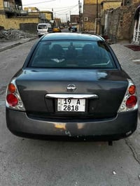 ورحمه الله وبركاته نيسان التيما ٤سلندر حجم محرك ٢٥٠٠ رقم نكليزي بسمي م...