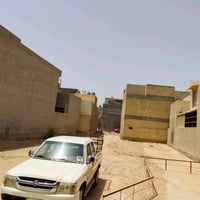 قطعة ارض خلف كلية دجله قريبه من السده ( نهر دجله )  تحت جسر الطابقين ا...