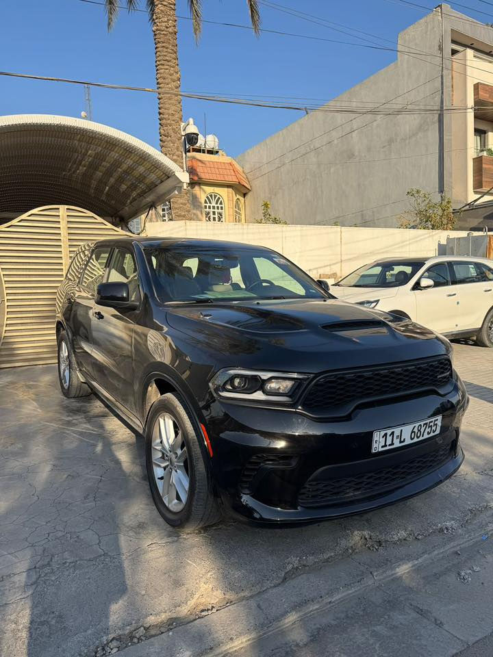 أعلان بيع 
للبيع سيارة  دورنكو GT *Dodge Durango GT 2023* بحالة ممتازة.

1. معلومات أساسية
- *الملكية*: باسمي - وارد أمريكي
- *الحادث*: حادث بسيط في الدعامية الأمامية وتم اعادتها مع تبديل ويل أمامي فقط ( بالامكان الاطلاع على صور الحادث ) 
- *اللون*: أسود
- *المكان*: بغداد
- *السعر المطلوب*: 320 ورقة
- *للتواصل*: ***********

2. المواصفات الميكانيكية
- *المحرك*: 3.6L V6 بنزين
- *ناقل الحركة*: أوتوماتيك - كفالة كير وصدر
- *الدفع*: رباعي 4x4
- *الإطارات*: بحالة  جيدة
- *نظام ABS*: مانع انزلاق
- *نظام Start/Stop*: إطفاء وتشغيل أوتوماتيكي

3. المواصفات الخارجية والداخلية
- *المصابيح*: زينون أمامي + LED + كشافات ضباب زينون
- *البنيد*: محدث أصلية
- *البدي*: بدون صبغ
- *المقاعد*: جلد أصلي VIP
- *الصندوق الخلفي*: كهربائي
- *المقود*: رياضي كهربائي مع تدفئة وتحكم كامل

4. التكنولوجيا والراحة
- *الشاشة*: شاشة لمس 10.1 إنش
- *نظام الملاحة*: GPS مدمج
- *نظام الصوت*: أصلي
- *الكاميرا*: خلفية ممتازة
- *التشغيل*: بصمة تشغيل + بصمة أبواب + بصمة الصندوق + تشغيل عن بعد
- *المقاعد*: تحكم كهربائي كامل لمقعد السائق 
- *Gear Shifters*: Paddle Shift خلف المقود

5. أنظمة السلامة
- *رادار أمامي* مع نظام مانع التصادم
- *حساسات خلفية* أصلية
- *تحذير مغادرة المسار* Lane Departure Warning
- *تحذير النقطة العمياء* Blind Spot Detection
- *تحكم ستيرن*: بلوتوث، مكالمات، مثبت سرعة Cruise Control، تحكم صوتي

السيارة نظيفة وجاهزة للاستخدام المباشر. للمعاينة والفحص، التواصل على الرقم أعلاه.

