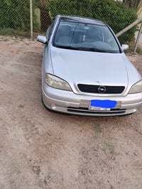 اوبل استرا موديل ٢٠٠٢ باسمي كير عادي كير محرك مكفول صبغ حزام للجماليه ...