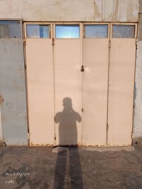 باب دفتري ٤ • طول ٥م • رفوف محل ٣٣