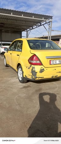 نيسان فيرسا موديل 2009  كيرومحرك شرط هيأ صفر  تبريد وتتفيه 07515288286...