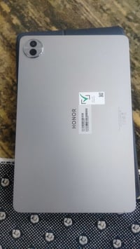 هونر باد 10 • حافظة وشاحن • استعمال اقل من شهر