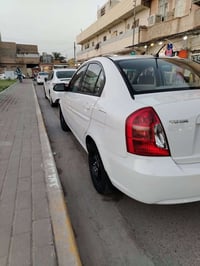 اكسنت للبيع ٢٠١٠ رقم بغداد بسمي سعر 90 بيه مجال 07810716985