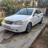 اوبترا 2011رقم بغداد انكليزي السياره مصبوغه حزام السعر 72وبيه مجال مكا...