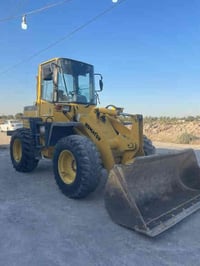 شفل كوماتسو حجم100 للبيع  موديل 2019 مني فيست  مكينه جديده بمعنى الكلم...