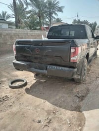 نيسان تاتان موديل 2023 وارد امريكي سياره فول  عله ضربتهه بعدهه للبيع ا...