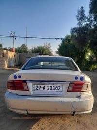 اوبتما • ٢٠٠١ • باسمي