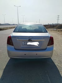 بيع مستعجل وبلاااش اوبترا موديل 2009   رقم بغداد الجديد شبه المميز  سن...