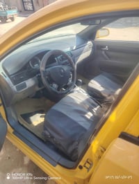 اوبتره موديل ٢٠١٢ شركه العامه مكفوله السعر 65 وبيها 07800419761