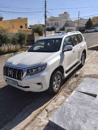 برادو موديل ١٨  فئة TXL ماشية 86الف  بيهه صبغ باب خلفي جهة السكن وبيهه...