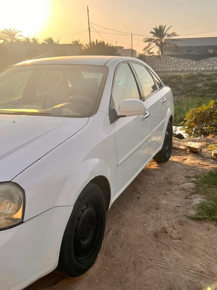 أوبترا 2010 حادثها فقط باب الايمن ربع منه وجاملغ تبريد فول تخم تاير جديد محرك كير كله جديد السعر 73وبيها مجال العنوان النجف الاشرف الرقم ***********
