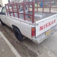 لبيع نيسان 94 رقم بغداد صدامي شرط التحويل مكينه وكير منجي 4 صدر وحدادي...