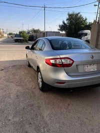 رينو فلاونز  سياره مكفوله ماشيه 60 سعر 85 عنوان بغداد 07717020361