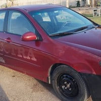 السـلام علـيكم... للبيـع كيـا سـبكـترا 2009 رقـم انبار حادثها فقط جامل...