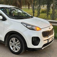 كيا سبورتج 2018 ابيض مكفوله بدون صبغ   رقم بغداد الجديد سعر (154)  كير...