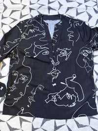 قميص • قياس XL • طول ٣ اشبار