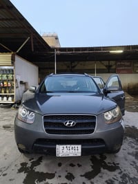 سنتافيا  رقم بغداد خليجي موديل 2008 فول موصافات عدى البصمة  سبعة راكب ...