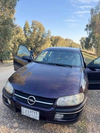 اميگا بزون • ١٩٩٥ • حي الميثاق